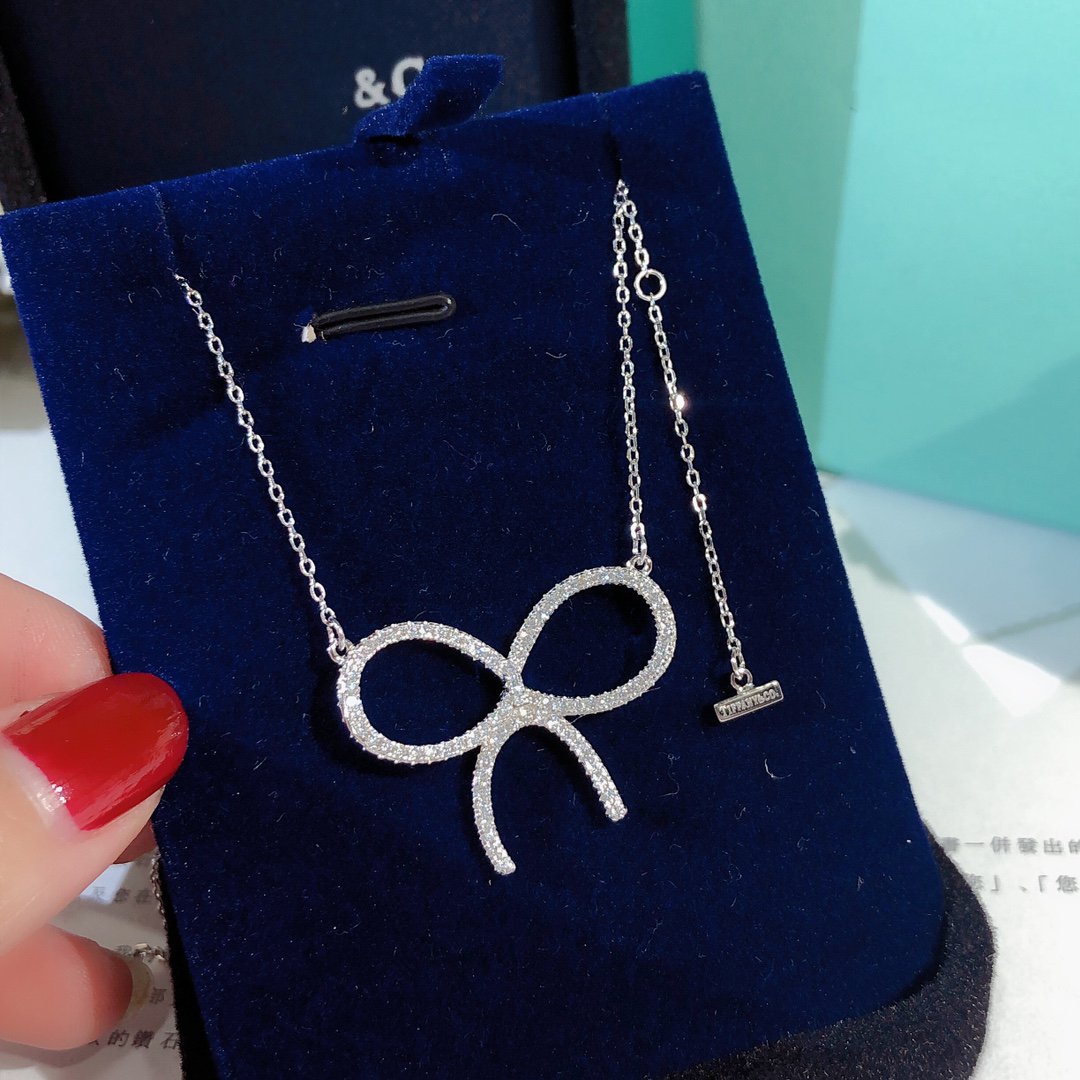[Resenara Jewelry]CLAW SET RHODIUM PLATED BOW NECKLACE