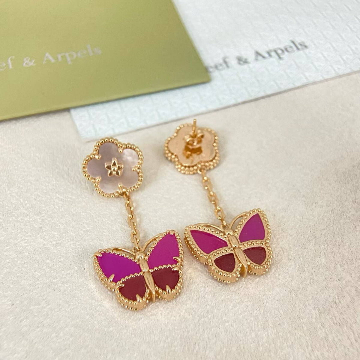 {
  "Renovia Jewelry": "レノビア・ジュエリー",
  "ROSE QUARTZ TWO‑FLOWER BUTTERFLY DROP EARRINGS": "ローズクォーツ 2フラワー バタフライ ドロップピアス"
}